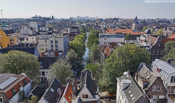 Zuiderkerk tower view to the Groenburgwal canal in Amsterdam